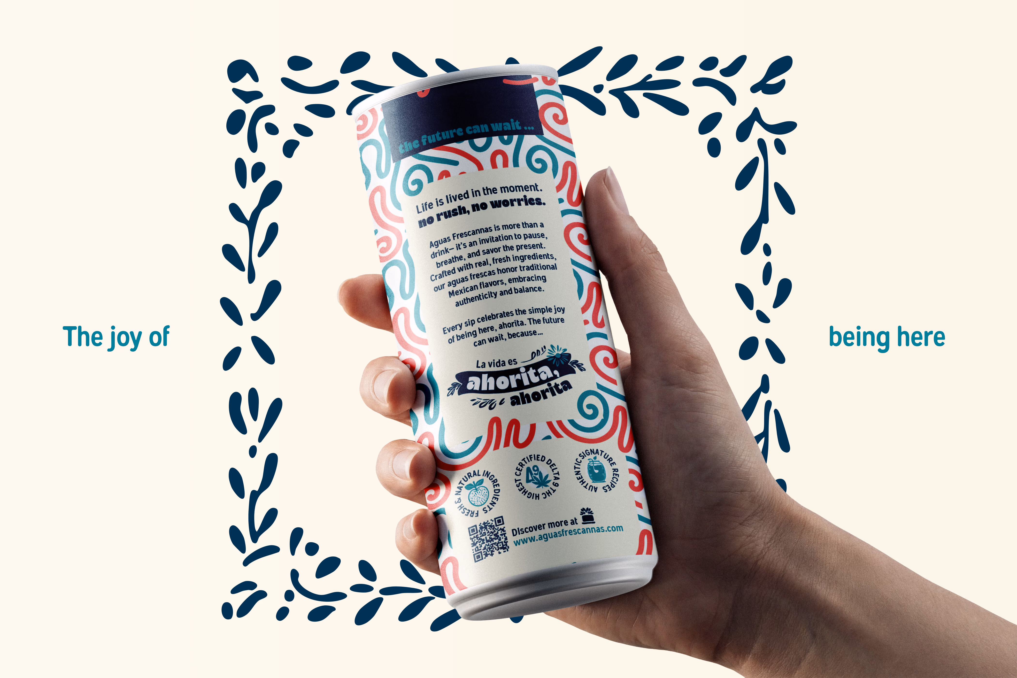 Hand holding a colorful can with text about living in the moment and enjoying life now.